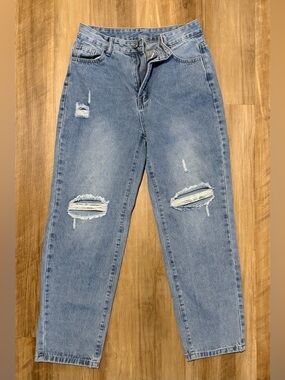 Women’s Light Blue Distressed Denim Jeans